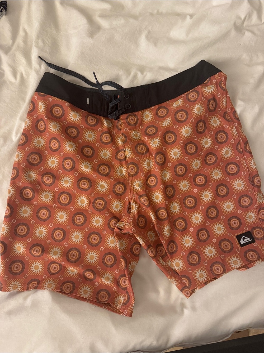 Quiksilver Men’s Orange Sunburst Pattern Swim Shorts